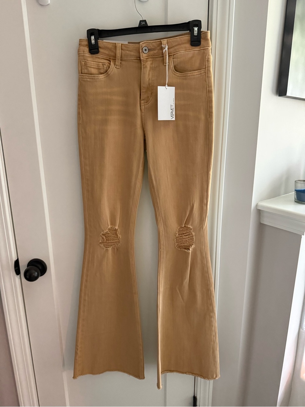 High-Rise Tan Flare Jeans with Knee Distress